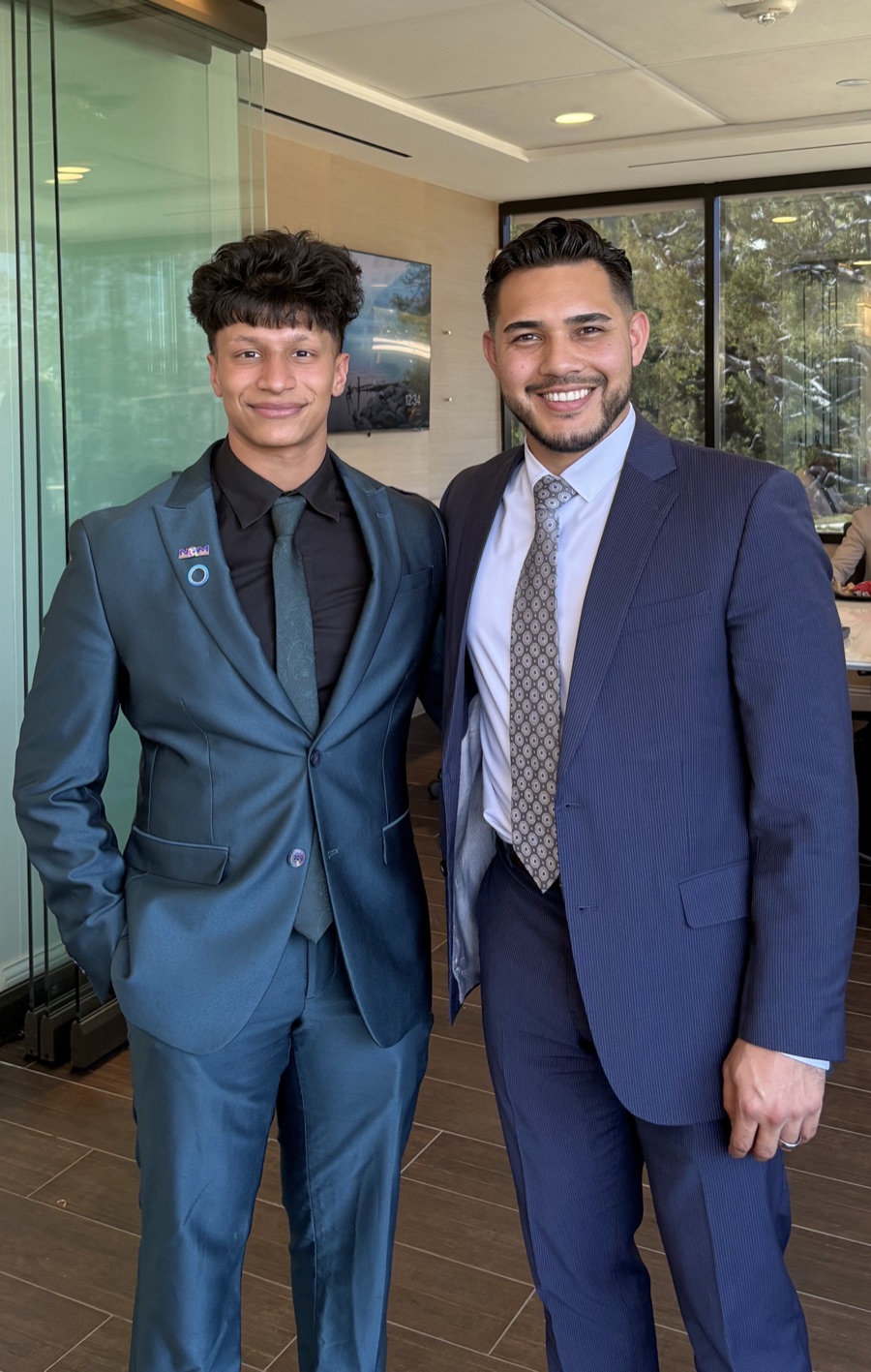 Versatile Dynamics team collaborating in a professional office setting